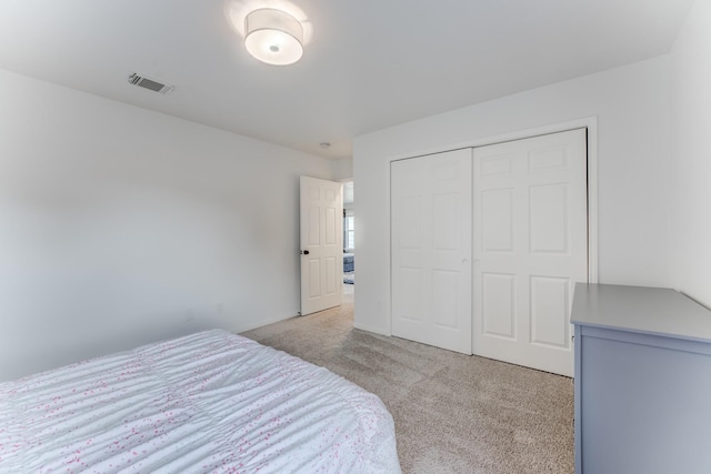 17814 Placid Oak Ct, Cypress, TX 77433 - bedroom with light colored carpet and a closet