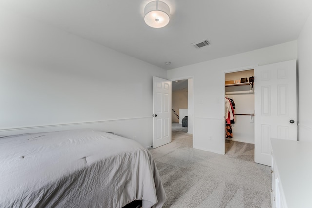 17814 Placid Oak Ct, Cypress, TX 77433 - bedroom featuring light carpet and a spacious closet