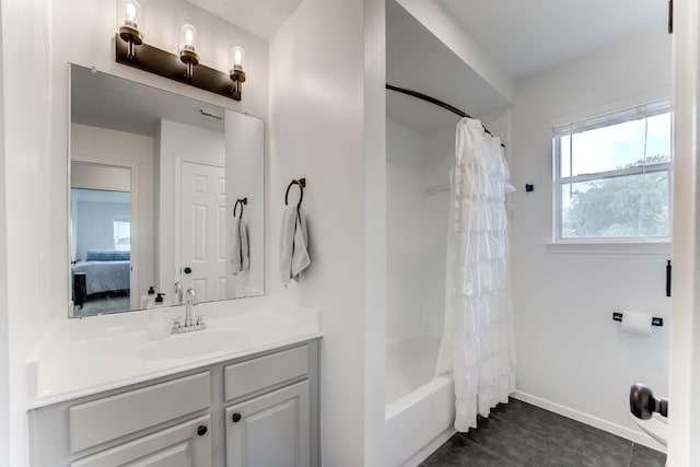 17814 Placid Oak Ct, Cypress, TX 77433 - ensuite bathroom with vanity, tile patterned floors, and shower / bath combination with curtain