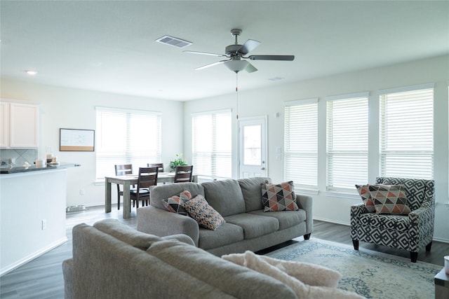 18802 Verdura Dr, New Caney, TX 77357 - living area featuring a ceiling fan and wood finished floors