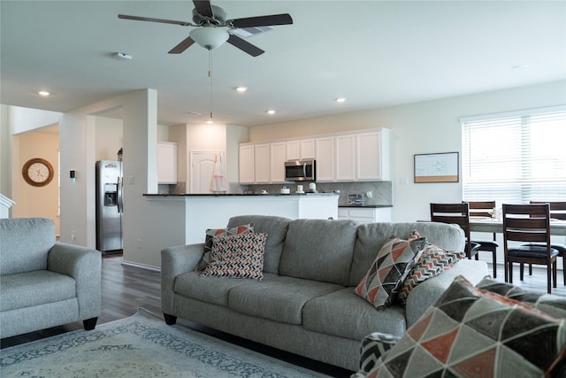 18802 Verdura Dr, New Caney, TX 77357 - living area featuring wood finished floors, a ceiling fan, and recessed lighting