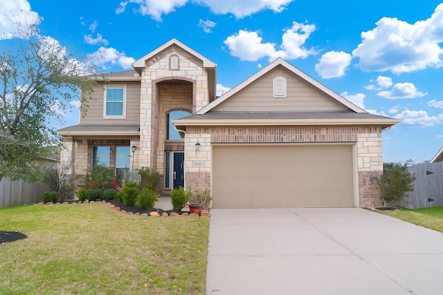 18802 Verdura Dr, New Caney, TX 77357 - view of front of home with stone siding, an attached garage, concrete driveway, and brick siding