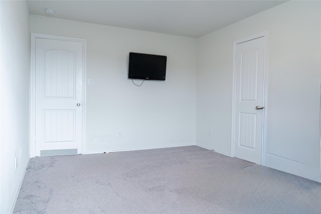 18802 Verdura Dr, New Caney, TX 77357 - empty room featuring carpet floors and baseboards