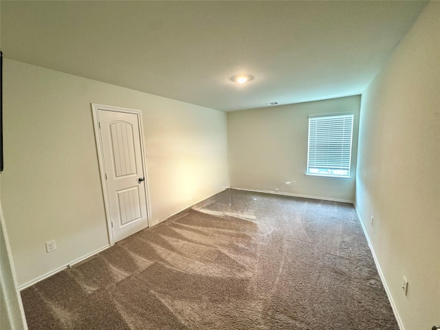 18802 Verdura Dr, New Caney, TX 77357 - empty room featuring carpet flooring