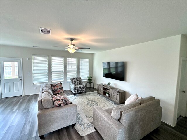 18802 Verdura Dr, New Caney, TX 77357 - living area with wood finished floors and ceiling fan