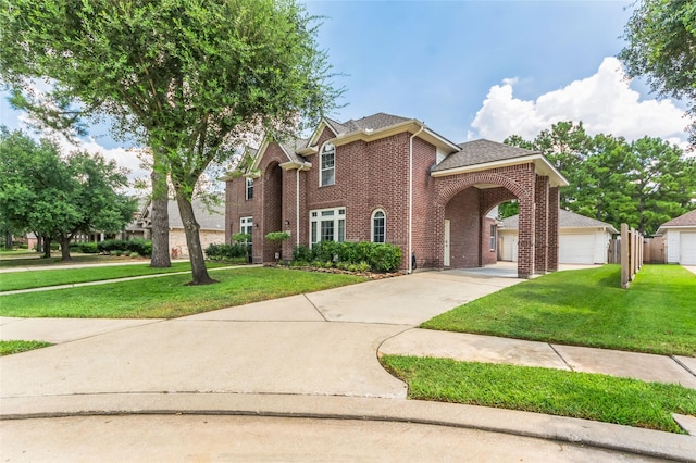 10906 Silverado Trace Dr, Houston, TX 77095 - traditional-style home with brick siding, a front yard, and a shingled roof