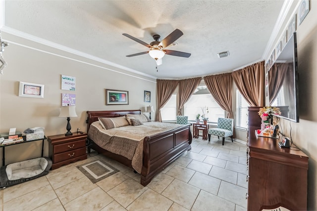 10906 Silverado Trace Dr, Houston, TX 77095 - bedroom with light tile patterned floors, ornamental molding, a textured ceiling, and ceiling fan