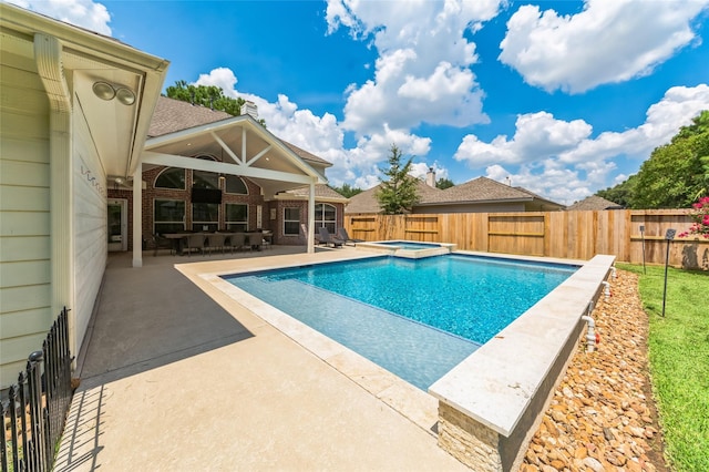 10906 Silverado Trace Dr, Houston, TX 77095 - view of swimming pool with a patio, a fenced backyard, and a pool with connected hot tub