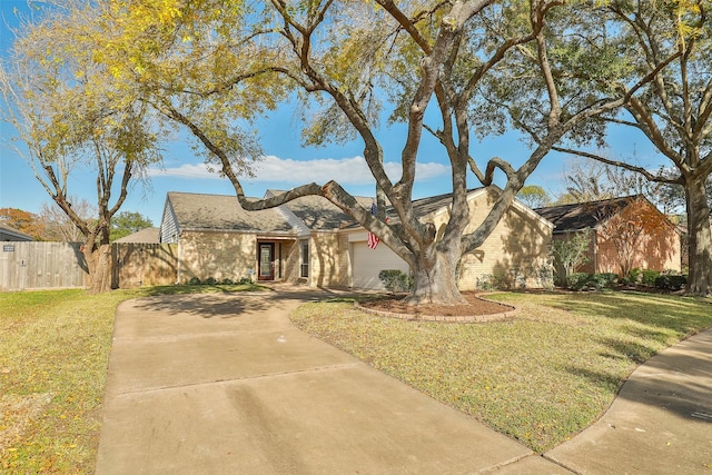 11822 Poplar Creek Dr, Houston, TX 77077 - mid-century modern home with concrete driveway, a garage, and brick siding