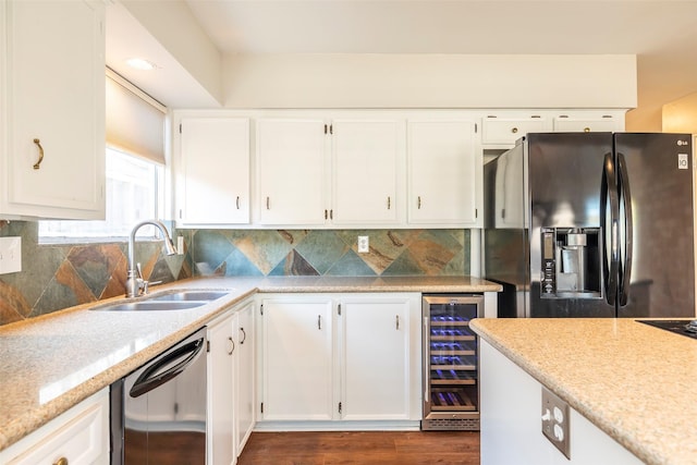 11822 Poplar Creek Dr, Houston, TX 77077 - kitchen featuring fridge with ice dispenser, wine cooler, dishwashing machine, and white cabinets