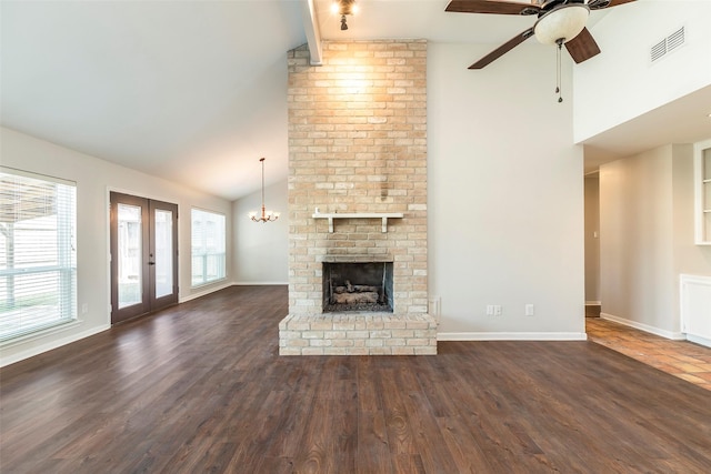 11822 Poplar Creek Dr, Houston, TX 77077 - unfurnished living room with high vaulted ceiling, a fireplace, a ceiling fan, dark wood-style floors, and a chandelier
