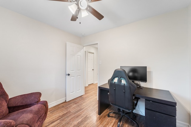 16230 Bowie Ridge Ln, Houston, TX 77053 - office area with a ceiling fan and light wood-style flooring