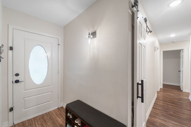 16230 Bowie Ridge Ln, Houston, TX 77053 - entryway with dark wood-style floors and baseboards