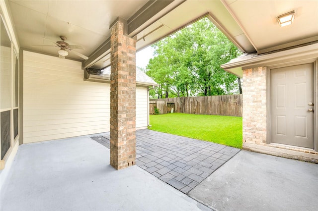 634 Oak Ridge Grove Cir, Spring, TX 77386 - fenced backyard with ceiling fan and a patio