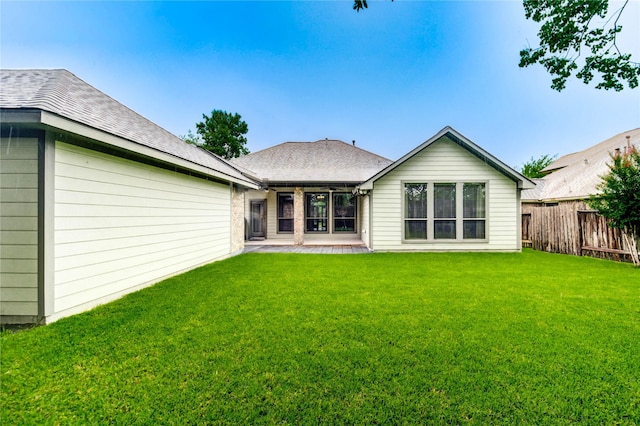 634 Oak Ridge Grove Cir, Spring, TX 77386 - rear view of property featuring a patio area and a shingled roof