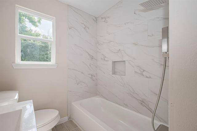 11311 Raincove Dr, Houston, TX 77016 - bathroom featuring tub / shower combination and vanity