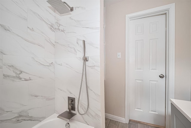 11311 Raincove Dr, Houston, TX 77016 - full bath featuring vanity and  shower combination