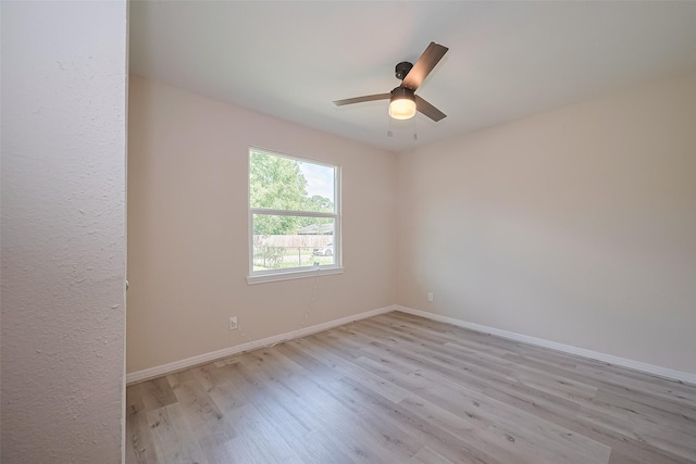 11311 Raincove Dr, Houston, TX 77016 - empty room with wood finished floors and ceiling fan