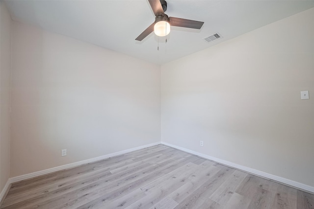 11311 Raincove Dr, Houston, TX 77016 - empty room with light wood finished floors and a ceiling fan