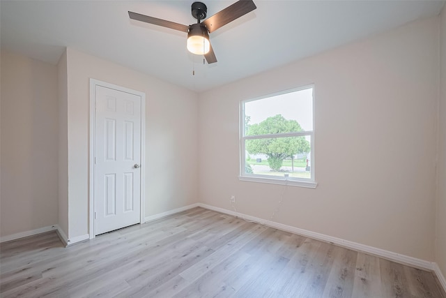 11311 Raincove Dr, Houston, TX 77016 - unfurnished room with light wood-style floors and a ceiling fan