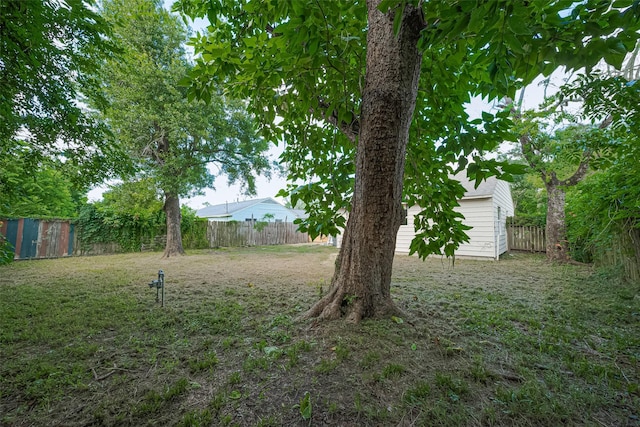 11311 Raincove Dr, Houston, TX 77016 - fenced backyard featuring a shed