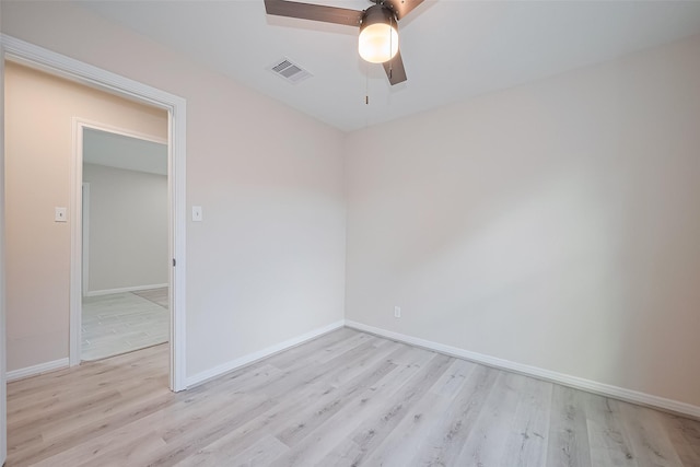 11311 Raincove Dr, Houston, TX 77016 - spare room with wood finished floors and ceiling fan
