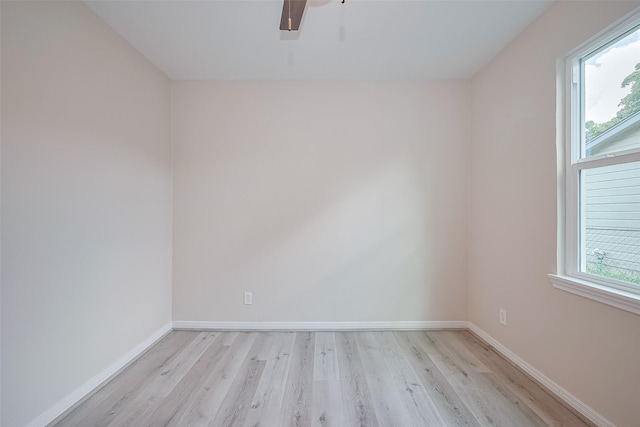 11311 Raincove Dr, Houston, TX 77016 - spare room featuring light wood-type flooring and ceiling fan