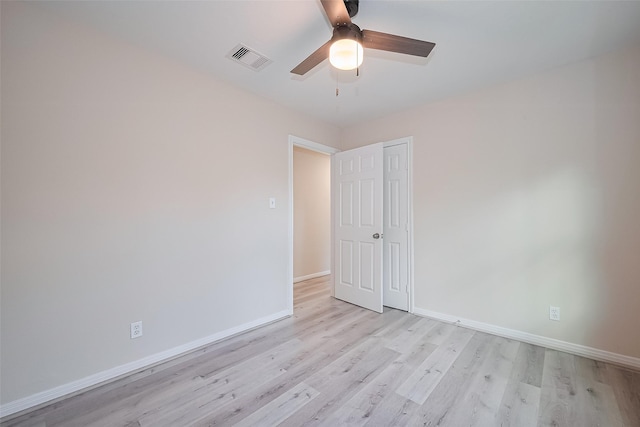 11311 Raincove Dr, Houston, TX 77016 - unfurnished room with light wood-type flooring and ceiling fan