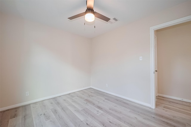 11311 Raincove Dr, Houston, TX 77016 - spare room featuring light wood-style floors and a ceiling fan