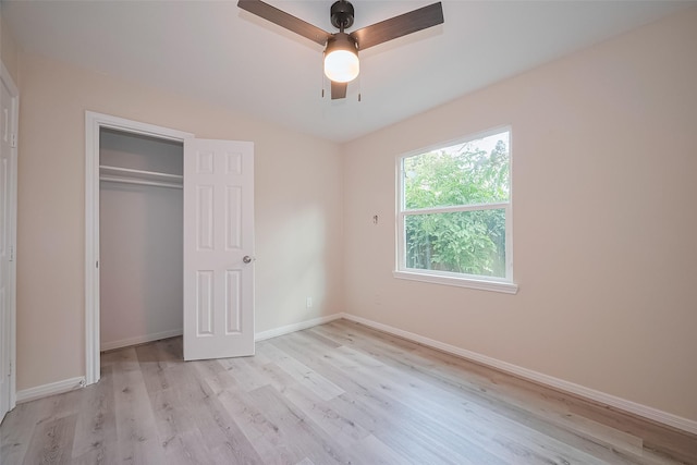11311 Raincove Dr, Houston, TX 77016 - unfurnished bedroom with light wood-type flooring, a closet, and ceiling fan