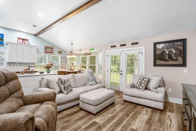 137 County Road 3665, Splendora, TX 77372 - living room featuring wood finished floors and french doors
