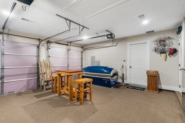 137 County Road 3665, Splendora, TX 77372 - garage with a garage door opener and electric panel