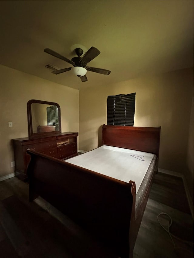 1206 11th St N, Texas City, TX 77590 - bedroom with a ceiling fan and wood finished floors