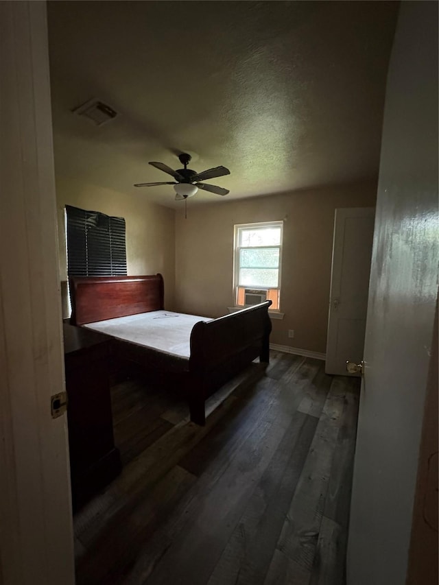 1206 11th St N, Texas City, TX 77590 - bedroom with wood finished floors and a ceiling fan