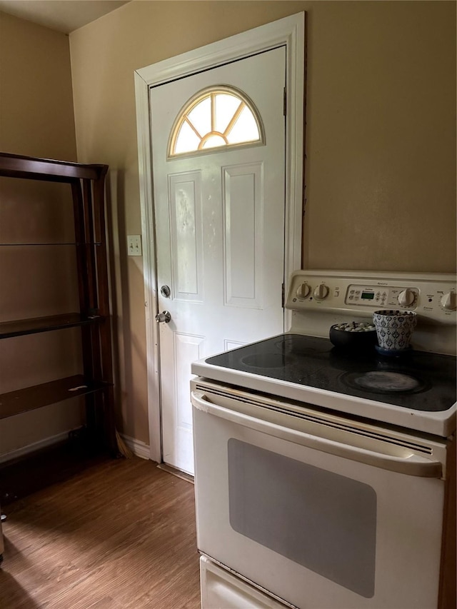 1206 11th St N, Texas City, TX 77590 - entrance foyer with light wood-type flooring and baseboards
