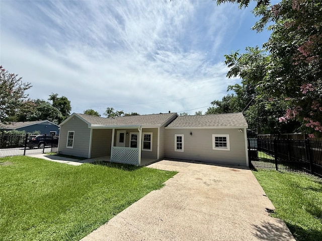 5701 Luna St, Houston, TX 77076 - back of house with a patio area, roof with shingles, and concrete driveway