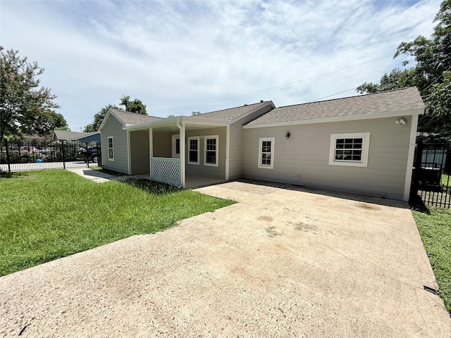 5701 Luna St, Houston, TX 77076 - back of property with a patio and roof with shingles