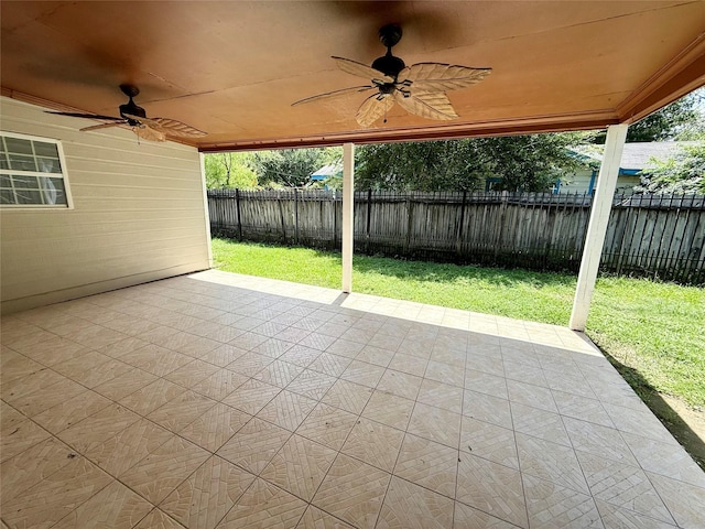 5701 Luna St, Houston, TX 77076 - fenced backyard with ceiling fan and a patio