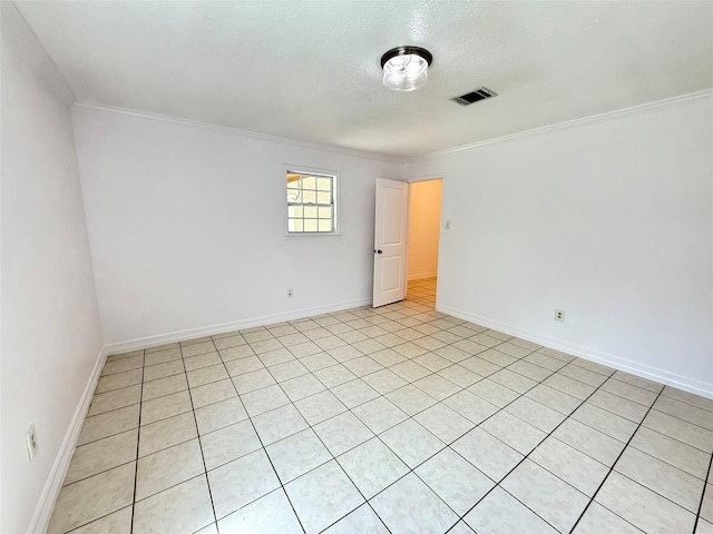 5701 Luna St, Houston, TX 77076 - empty room with crown molding and a textured ceiling