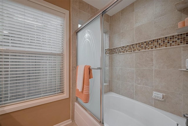 3031 The Highlands Dr, Sugar Land, TX 77478 - full bath with shower / bath combination with glass door and baseboards