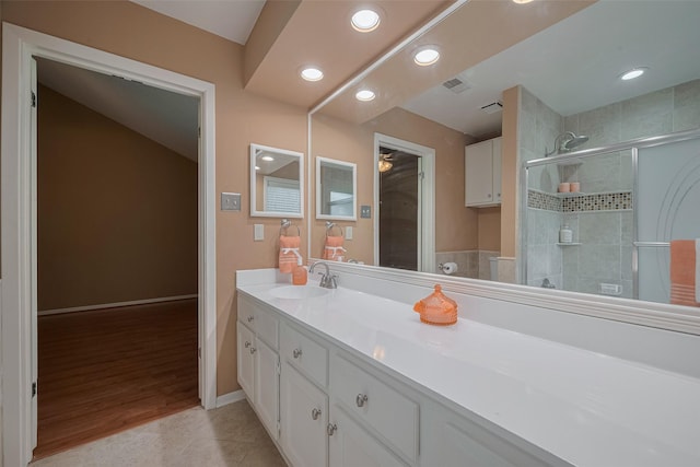 3031 The Highlands Dr, Sugar Land, TX 77478 - bathroom featuring vanity, a stall shower, recessed lighting, and tile patterned floors