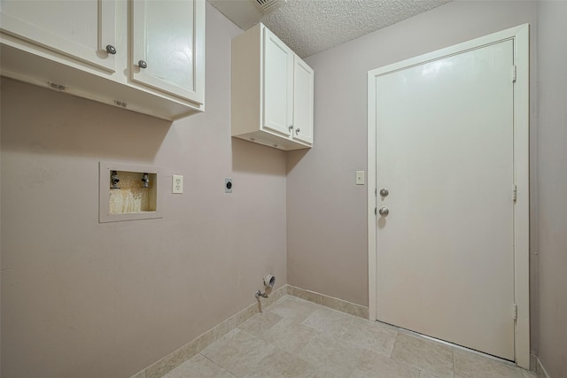 3031 The Highlands Dr, Sugar Land, TX 77478 - laundry area with hookup for an electric dryer, hookup for a washing machine, cabinet space, and gas dryer hookup