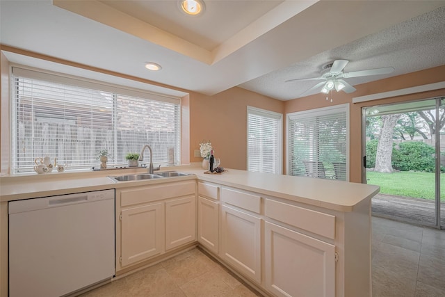 3031 The Highlands Dr, Sugar Land, TX 77478 - kitchen featuring dishwasher, light tile patterned flooring, a peninsula, light countertops, and recessed lighting