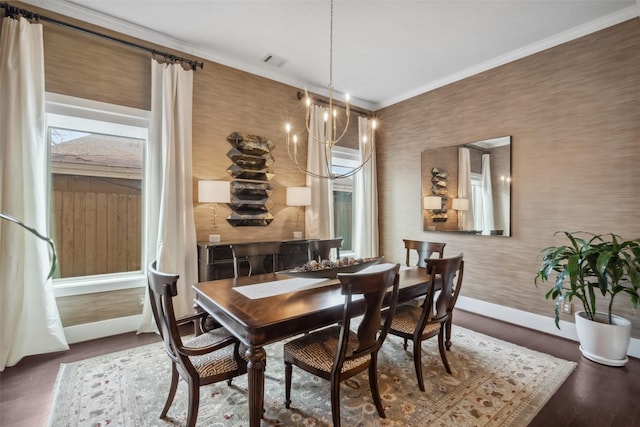 1746 Du Barry Ln, Houston, TX 77018 - dining room with a chandelier, wood finished floors, and ornamental molding