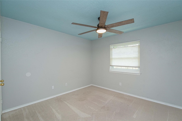 25418 Sugar Valley Ln, Spring, TX 77373 - spare room with a ceiling fan and light colored carpet