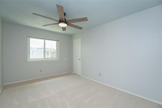 25418 Sugar Valley Ln, Spring, TX 77373 - empty room featuring ceiling fan, light carpet, and a textured ceiling