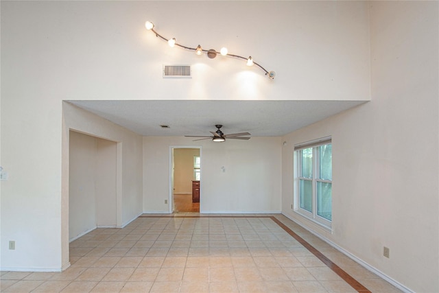 25418 Sugar Valley Ln, Spring, TX 77373 - unfurnished room with ceiling fan, plenty of natural light, and light tile patterned floors