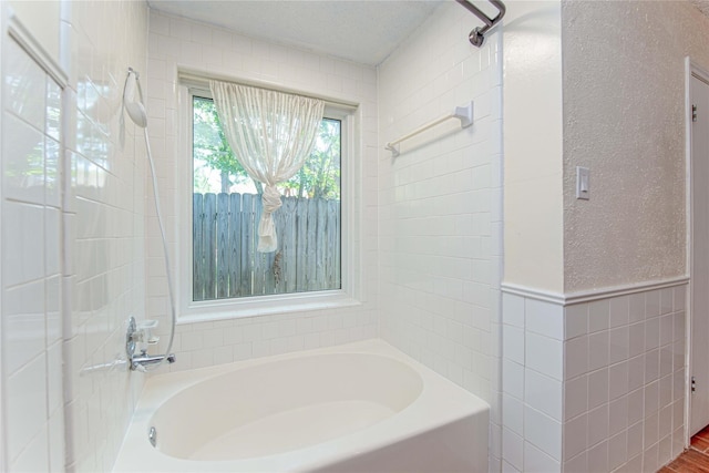 25418 Sugar Valley Ln, Spring, TX 77373 - full bath featuring a garden tub and tile walls