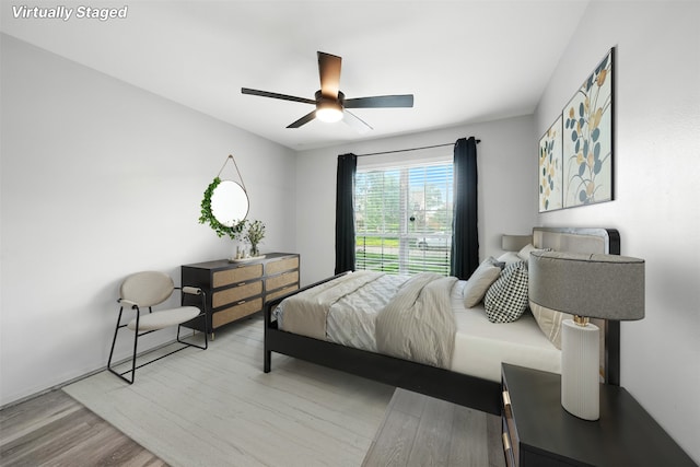 8503 Leader St, Houston, TX 77036 - bedroom featuring light wood-style flooring and a ceiling fan