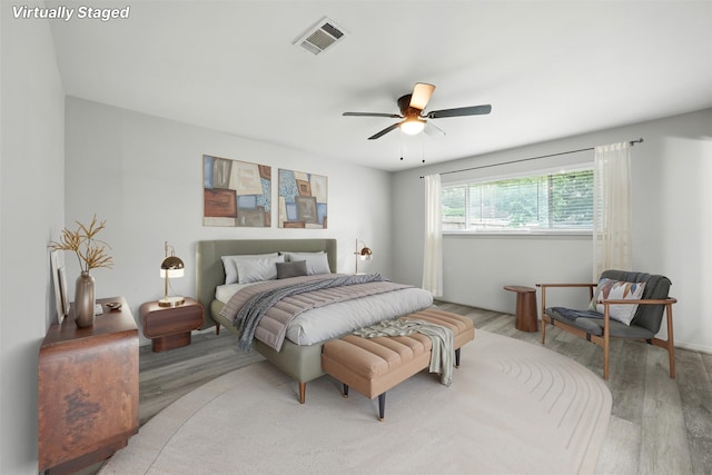8503 Leader St, Houston, TX 77036 - bedroom featuring wood finished floors and a ceiling fan